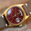 1971 Rolex Day-Date ref. 1803 in Yellow Gold, Ox Blood Stella Dial