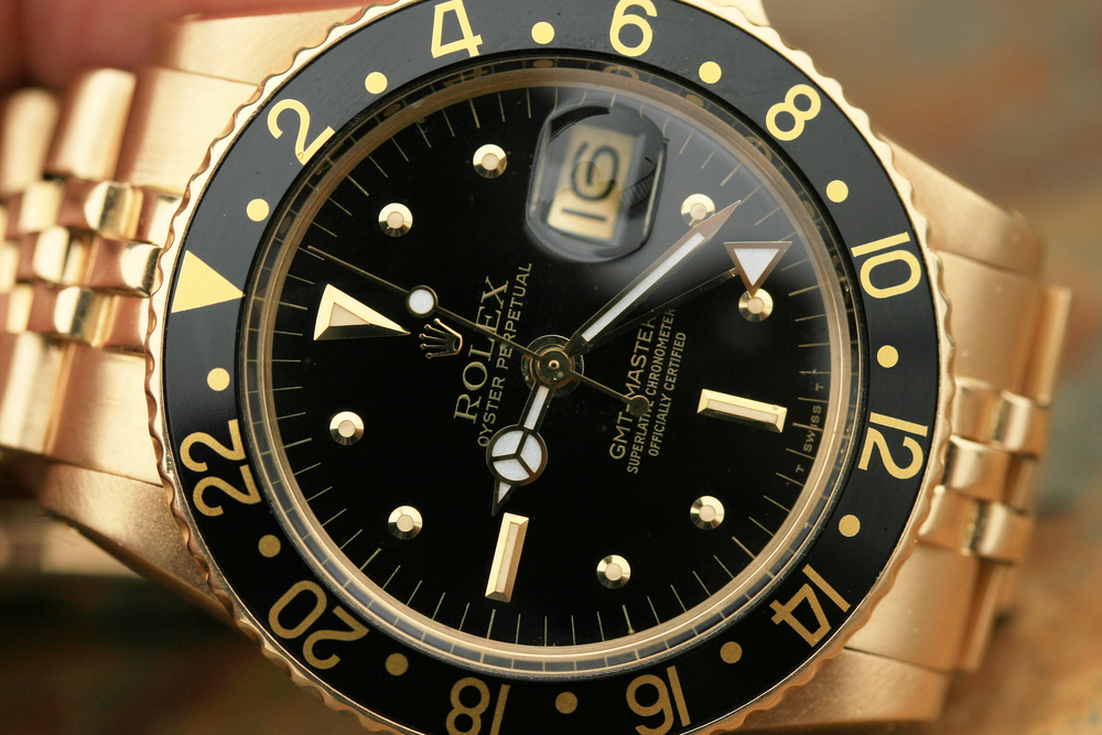 SOLD 1979 Rolex Gold GMT-Master 1675/8 Black Dial - Lunar Oyster ...